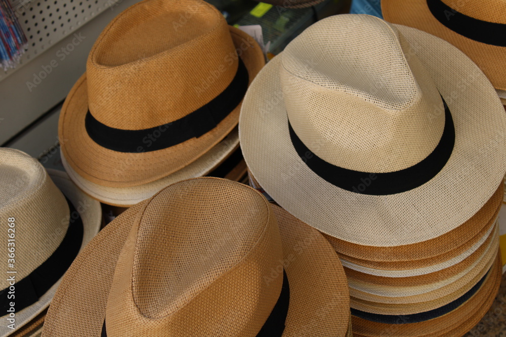 men hat on display of a garment store in rome italy