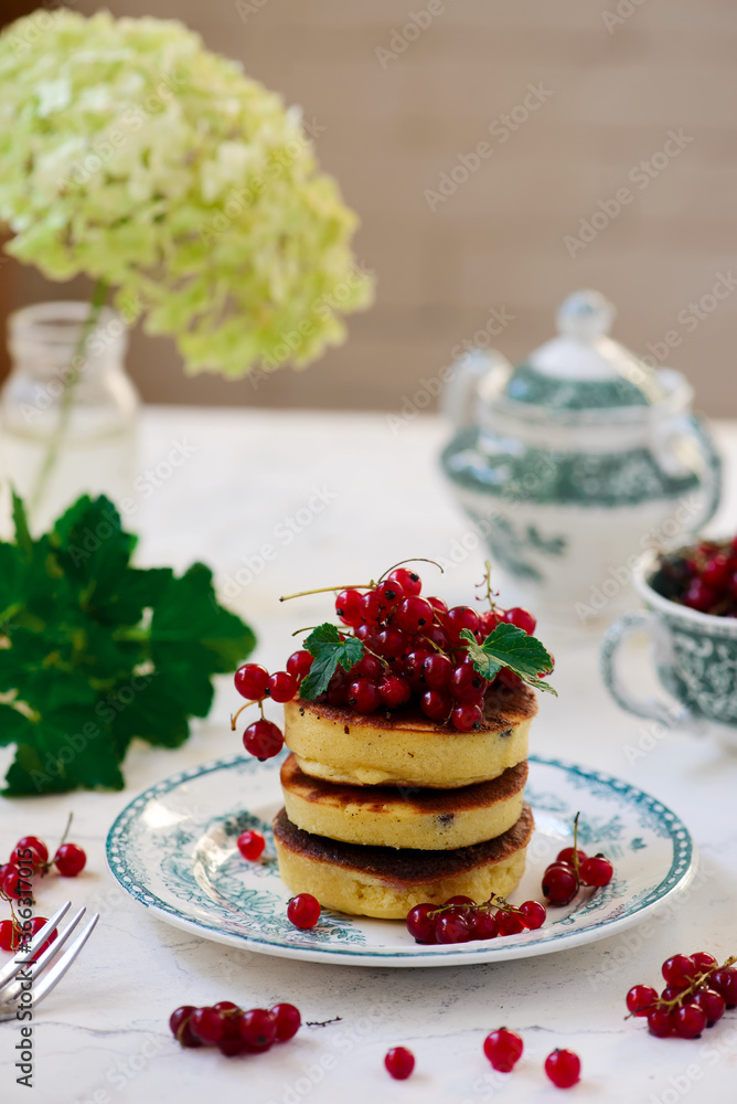 pancakes with red currant..style .selective focus pancakes with red currant..style .selective focus