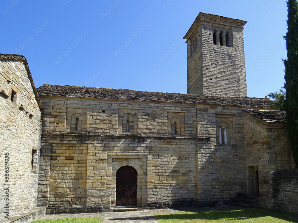 View of south facade of the Mozarab Pre-Romanesque or Romanesque Church of San Pedro de Larrede in the Serrablo Region. 10th-11th century. Aragon. Spain. View of south facade of the Mozarab Pre-Romanesque or Romanesque Church of San Pedro de Larrede in the Serrablo Region. 10th-11th century. Aragon. Spain.