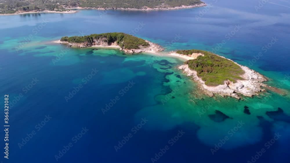 Aerial view of a beautiful tropical island in the Ionian Sea, Ksamil, Albania. Aerial view of a beautiful tropical island in the Ionian Sea, Ksamil, Albania.