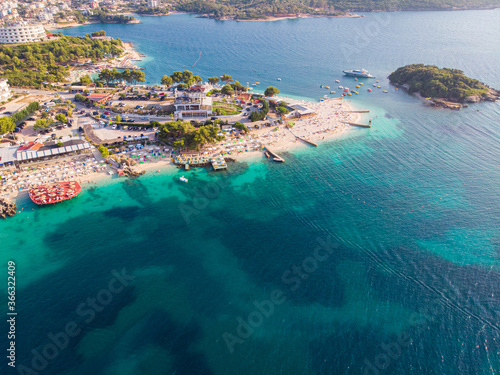 Aerial view of the coastline of the resort town of Ksamil on a sunny summer day. Albania. © MZaitsev
