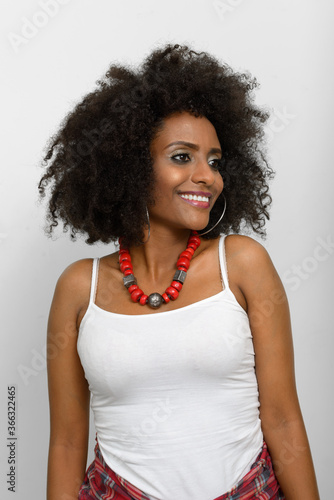 Portrait of young beautiful African woman with Afro hair