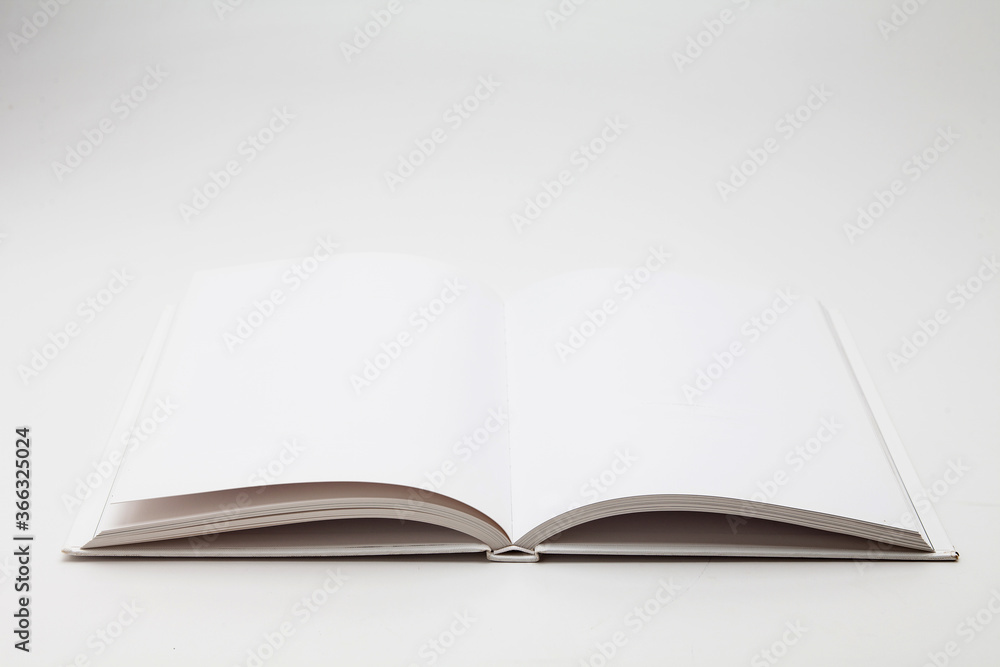 White book with no title standing on white background White book with no title standing on white background
