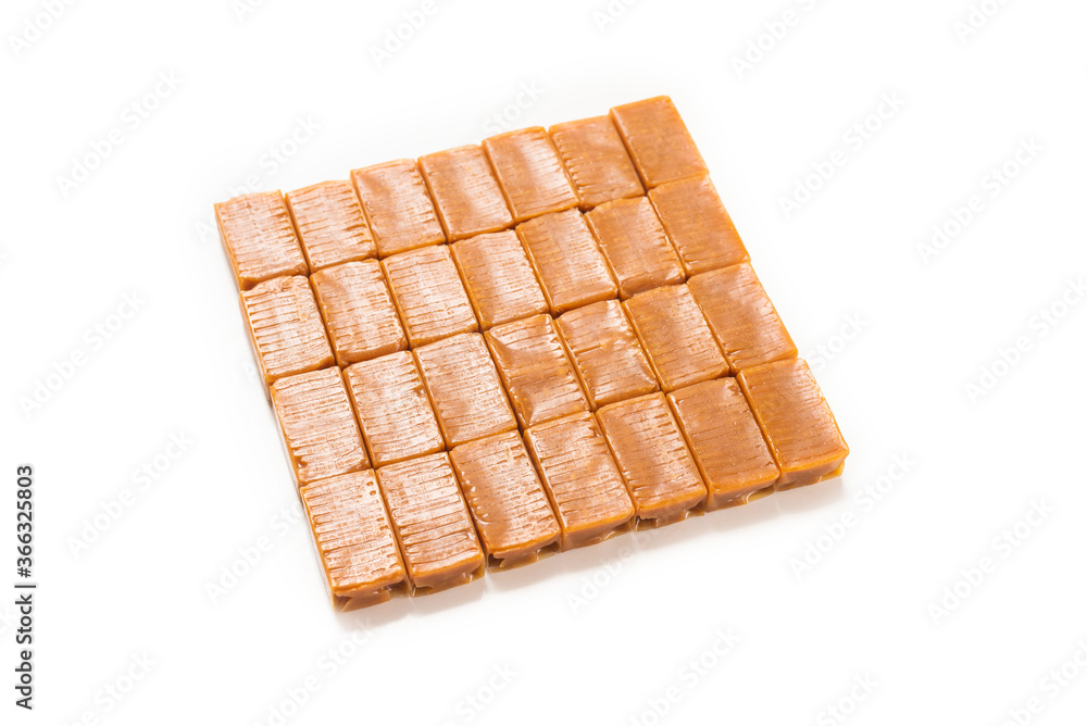 Tasty caramel candy isolated on white background. Tasty caramel candy isolated on white background.