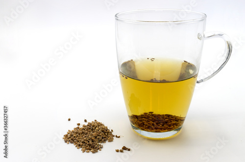 organic green anise seeds infused in a glass cup for good digestion