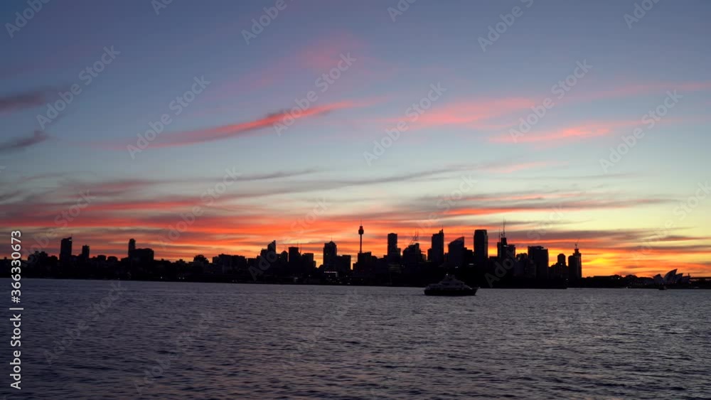 Spectacular after glow of Sydney skyline from ferry Spectacular after glow of Sydney skyline from ferry
