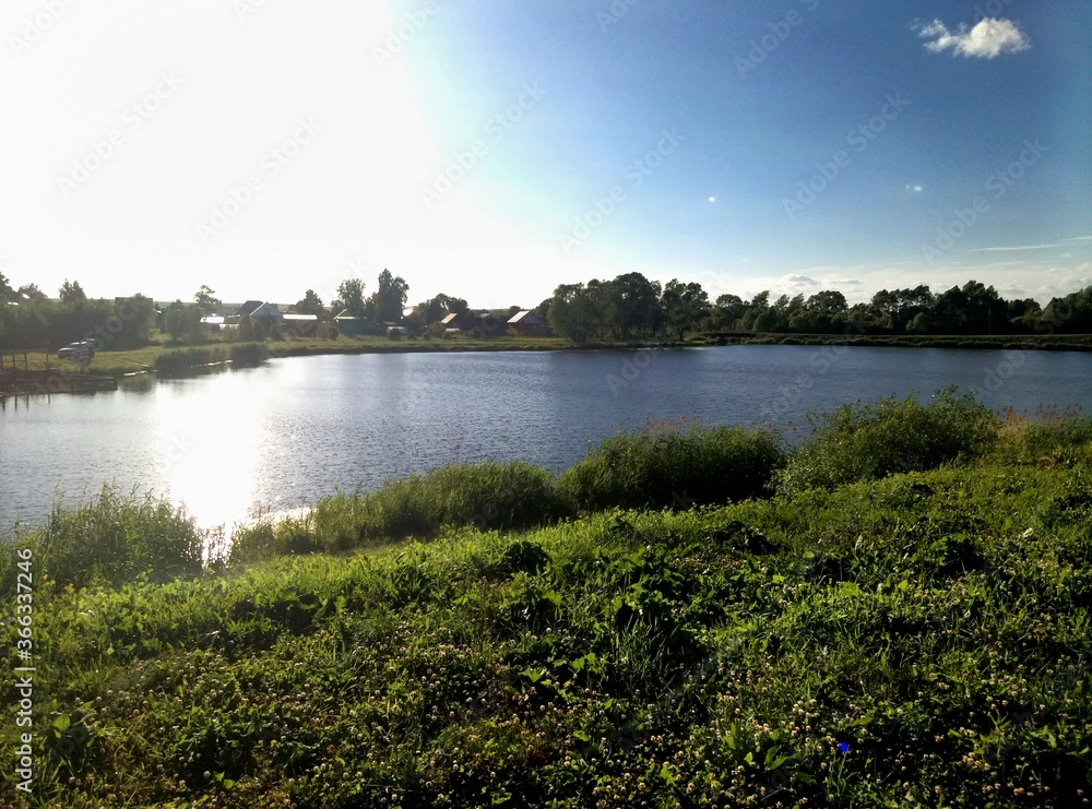 Fototapeta premium sunset over the lake