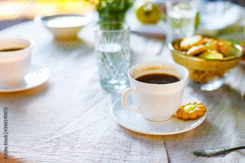 coffee and breakfast on the table tea party, coffee break outdoor food background top view copy space for text organic healthy eating