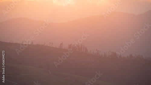 Wallpaper Mural sunset between clouds and mountains in summer Torontodigital.ca
