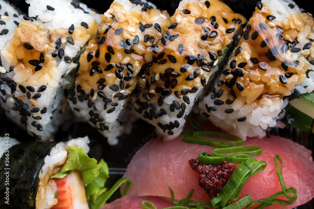 A set of sushi with salmon and tuna. A set of sushi with salmon and tuna.