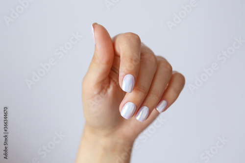 Female well-groomed hands and manicure. Hand care and hydration. Health and beauty concept
