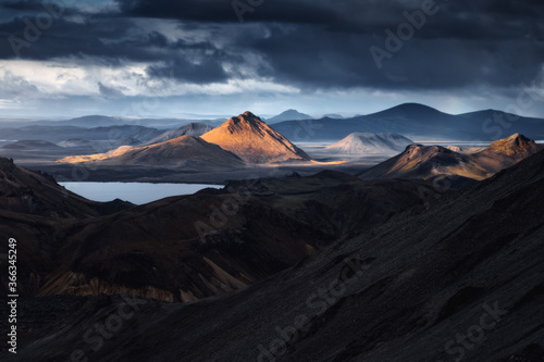 Landmannalaugar colorful rhyolite mountains in Iceland. Beautiful nature landscape in the sunset photo