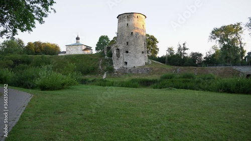 ensemble of the old tower and the old church on the hill