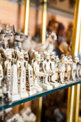 Souvenir Egyptian stuff statuettes in the store. photo