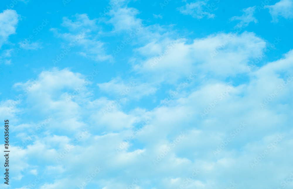 Blue sky with white Cumulus clouds. Atmosphere. Background. Natural phenomenon. Blue sky with white Cumulus clouds. Atmosphere. Background. Natural phenomenon.