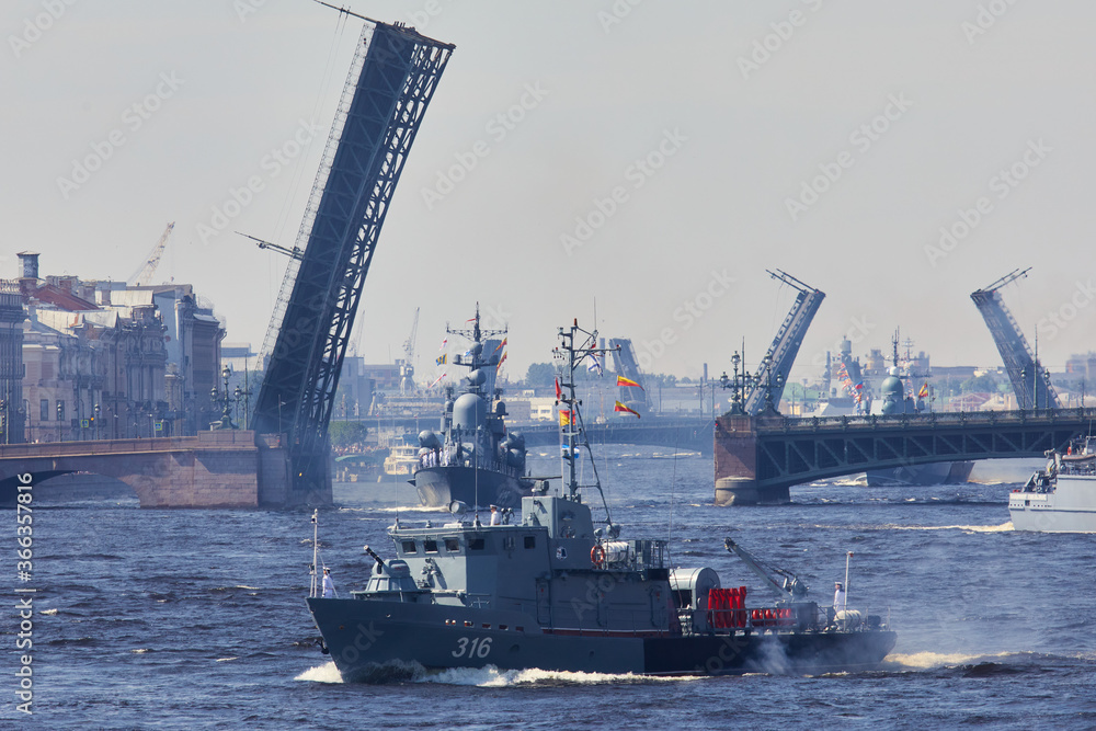 View of Russian Navy, modern russian military naval battleships warships in the row, northern fleet and baltic sea fleet, summer sunny day during the military exercise