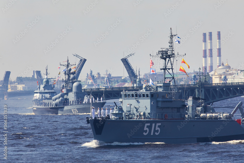 View of Russian Navy, modern russian military naval battleships warships in the row, northern fleet and baltic sea fleet, summer sunny day during the military exercise