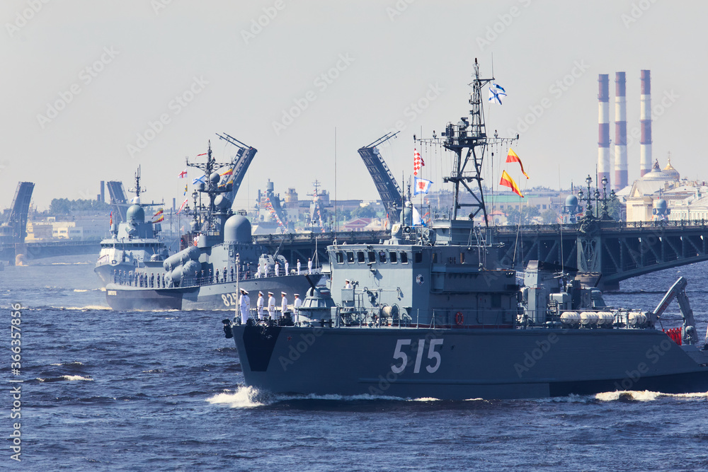 View of Russian Navy, modern russian military naval battleships warships in the row, northern fleet and baltic sea fleet, summer sunny day during the military exercise