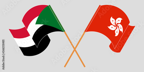 Crossed and waving flags of Sudan and Hong Kong