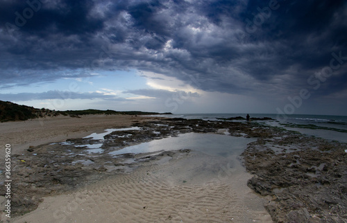 Dramatic storm on a mediterranean sea beach