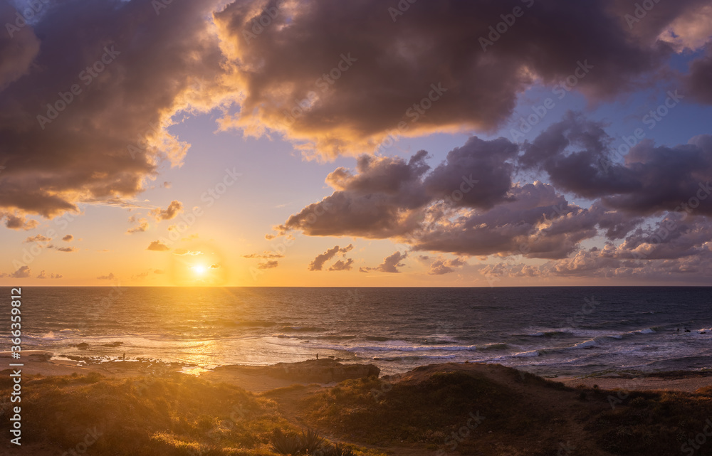 Sunset clouds on sea beach of romantic vacation