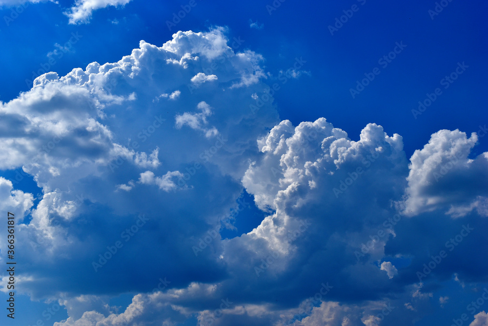 Blue and white storm Cumulus clouds before bad weather Blue and white storm Cumulus clouds before bad weather