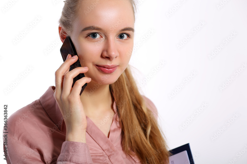 Girl in speaks on phone, participating in survey Girl in speaks on phone, participating in survey