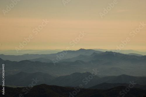 Layers of mountains under a clear sky
