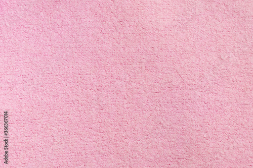 Pastel pink knitted woolen fabric texture