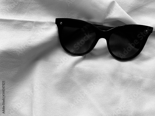 sunglasses on black background