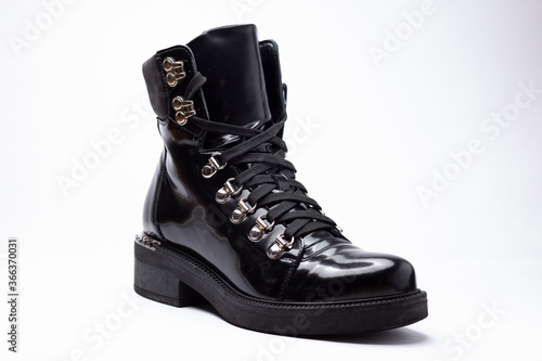 woman shoes black leather boots white background footwear fashion