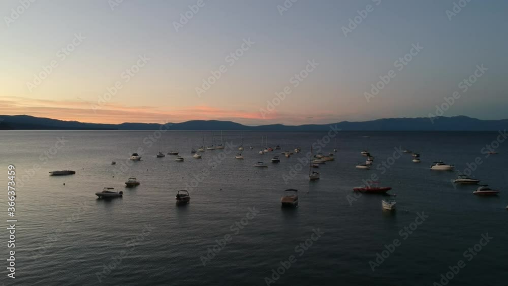 Aerial Over boats on sunset. Lake Tahoe, California, USA Aerial Over boats on sunset. Lake Tahoe, California, USA