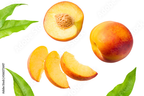 peach fruits with green leaf and slices isolated on white background. top view