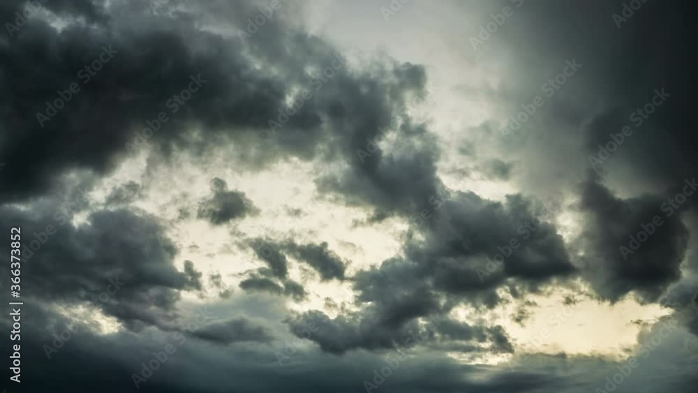 Dark storm clouds cover the sky. It's getting dark like night. Dark storm clouds cover the sky. It's getting dark like night.
