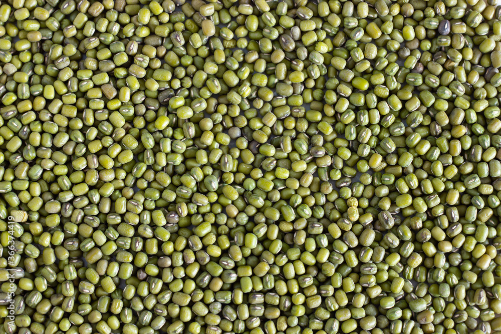 Green beans or mung beans background. Vegan food. Top view. Green beans or mung beans background. Vegan food. Top view.