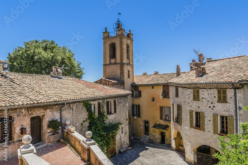 St Pierre and St Paul Church tower and Ancient gate 'Nice' in Cagnes-sur-Mer. Cagnes-sur-Mer (between Nice and Cannes) - commune of Alpes-Maritimes department - Cote d'Azur region, France. photo