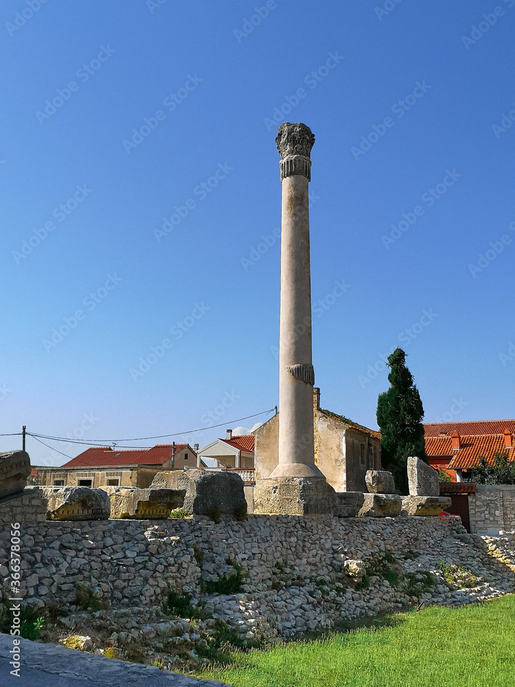 Fototapeta premium Ruins of the ancient Roman temple in historic town Nin in Croatia