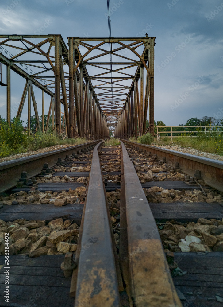 Rails at railway bridge over river in Wroclaw Rails at railway bridge over river in Wroclaw