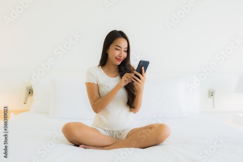 Portrait beautiful young asian woman use smart mobile phone