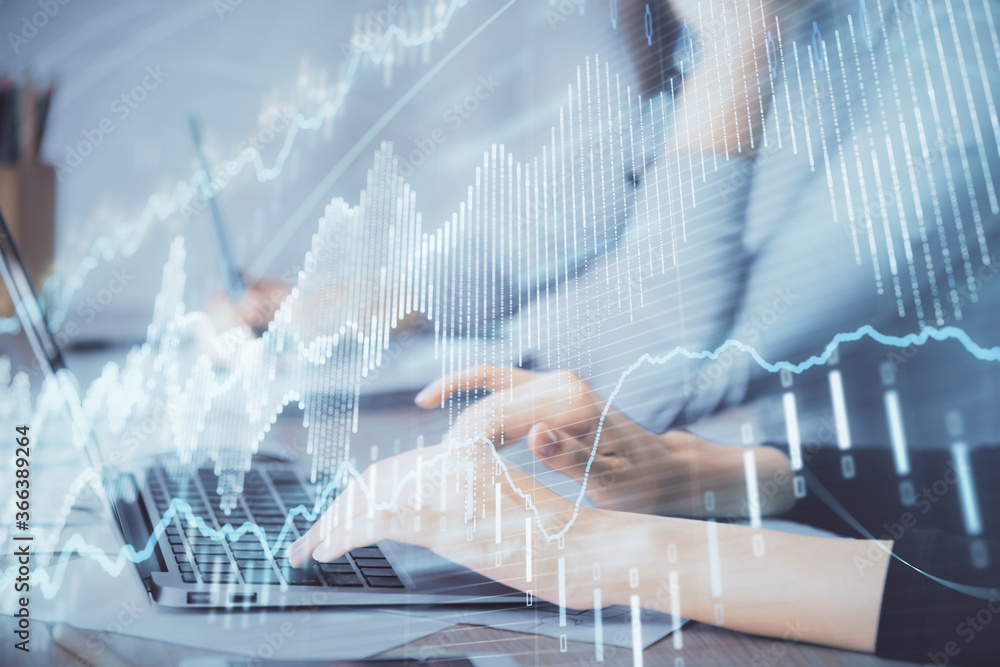 Multi exposure of woman hands typing on computer and financial chart hologram drawing. Stock market analysis concept. Multi exposure of woman hands typing on computer and financial chart hologram drawing. Stock market analysis concept.