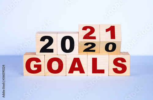 2020-2021 goal word on wooden blocks. The concept of achieving business goals  reaching new heights  execution.