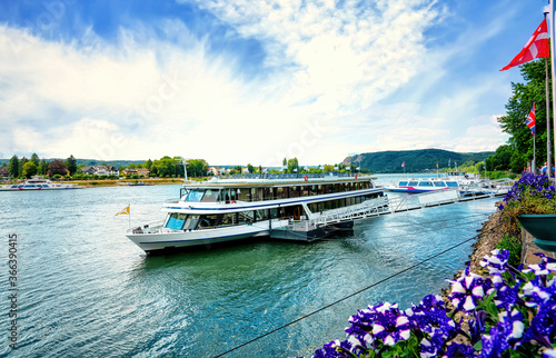Photography Rhine bank with ferry and sightseeing boat in Linz am Rhein (Linz on the rhine),