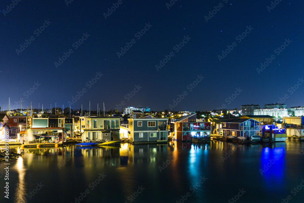 night in a small town with colourful houses on the water
