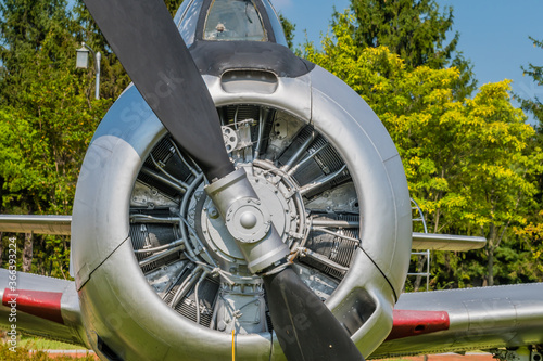 Closeup of engine and front cowling of T28 Trojan military training aircraft on display in public park. © aminkorea