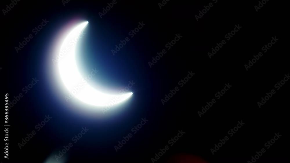 solar eclipse in the Dubai desert. almost anular, total phase of the eclipse. gentle panning form side to side, showing the eclipse. tight details 1200mm lens f4 solar eclipse in the Dubai desert. almost anular, total phase of the eclipse. gentle panning form side to side, showing the eclipse. tight details 1200mm lens f4