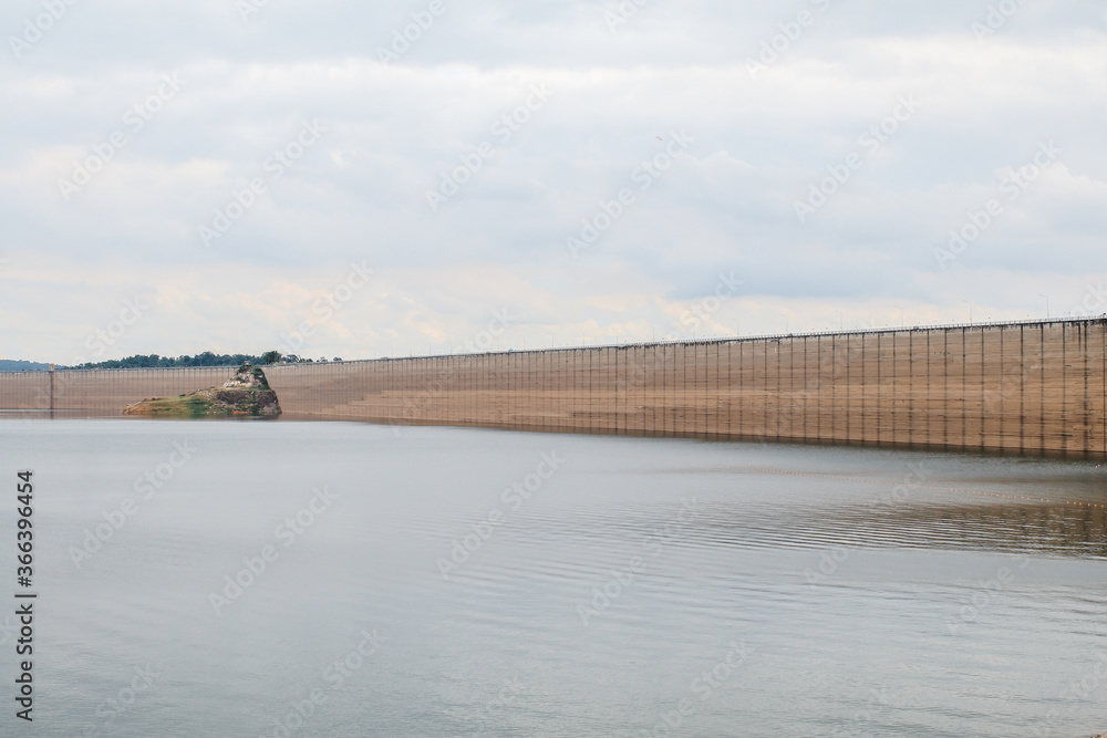 It is a concrete arch-gravity dam at Khun Dan Prakan Chon, Roller Compacted Concrete Dam, Nakornnayok, Thailand.