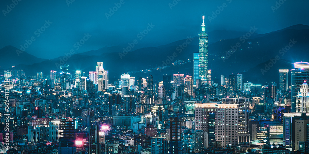 Taipei City Night View - Taipei Cityscape at Night in Blue Background, shot in Datong Mountain, Shulin District, New Taipei, Taiwan.