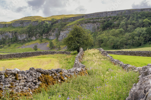 Arncliffe is a small village and civil parish in Littondale, one of the Yorkshire Dales in England. Littondale is a small valley beside Upper Wharfedale, 3 miles beyond Kilnsey and its famous crag photo