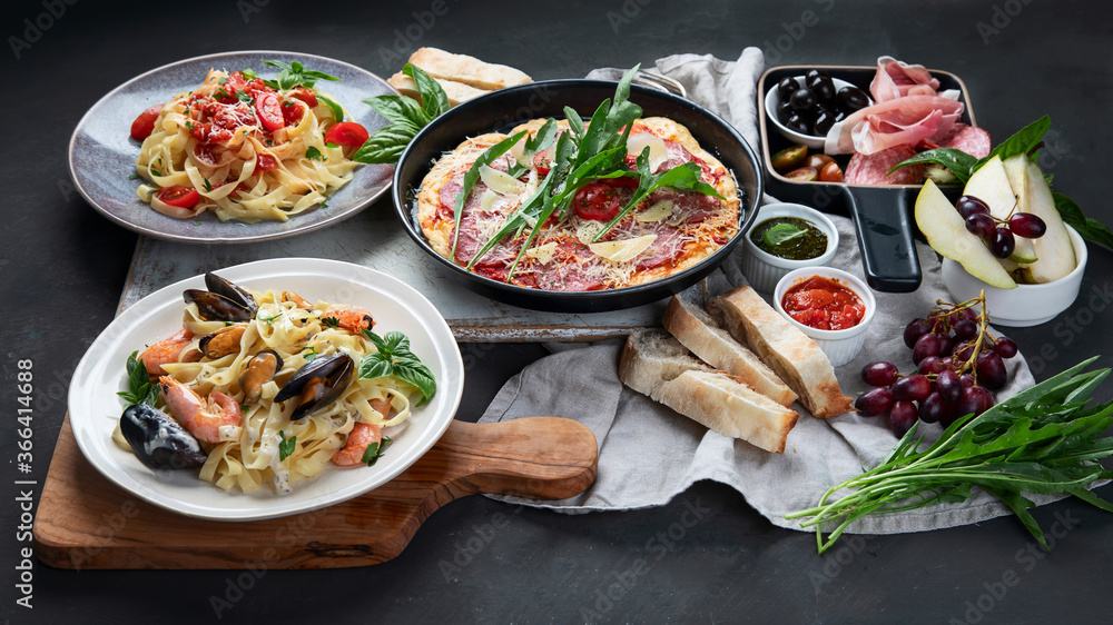 Italian food  on dark background