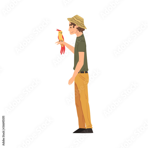 Male Zoo Worker with Parrot on his Hand, Veterinarian or Professional Zookeeper Character Caring of Wild Animals in Zoo Cartoon Vector Illustration